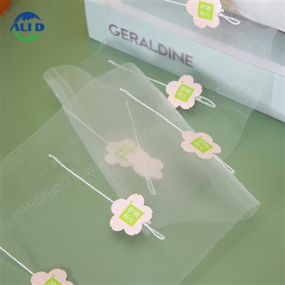 Obnovljiva piramidna folija za čajne vrečke z etiketo in vrvico